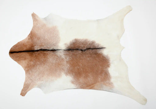 Roan brown and white goatskin rug