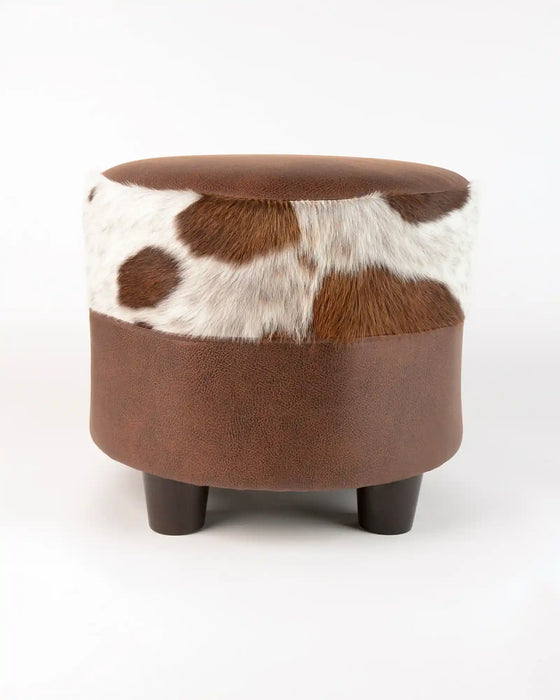 Brown and white round cowhide footstool #2