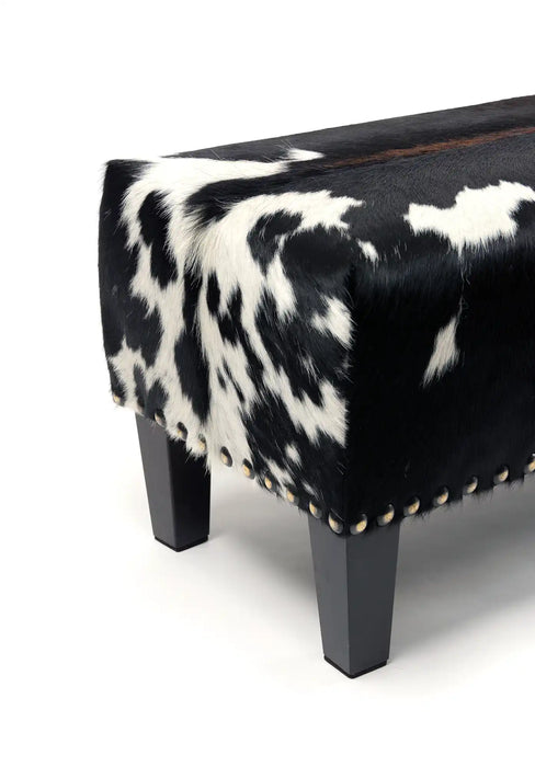 Cowhide Ottoman with Wood Legs and Studs 