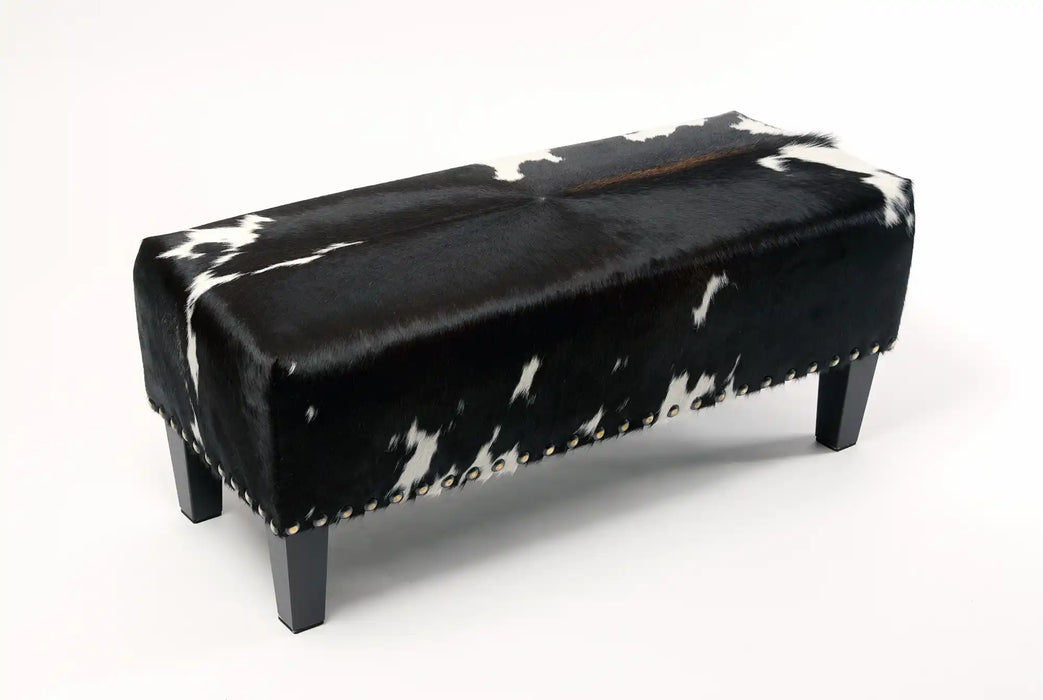 Cowhide Ottoman with Wood Legs and Studs 