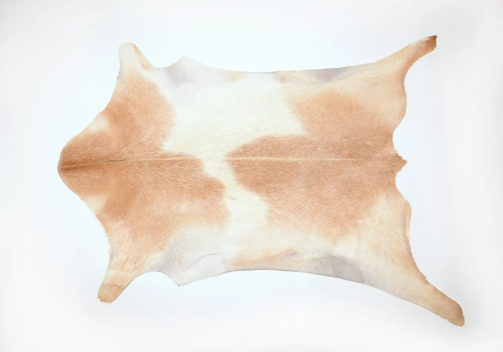 Tan and white goatksin rug #027